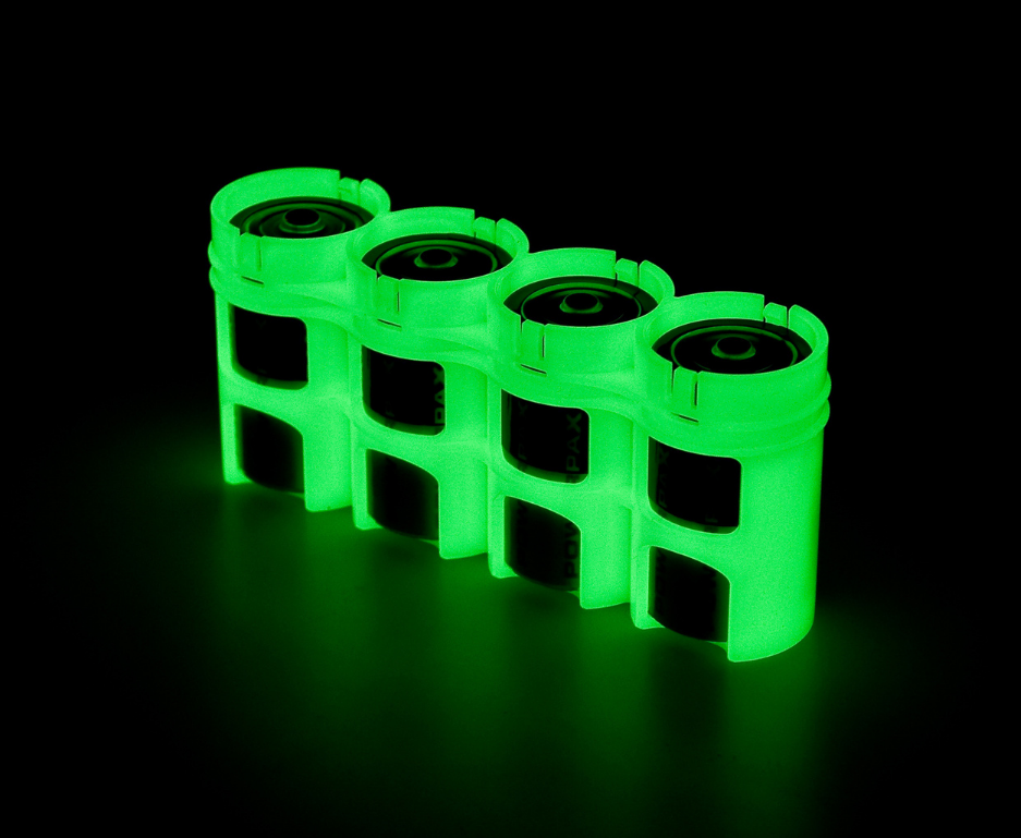 A single Slim Line D4pk glowing green with a black background